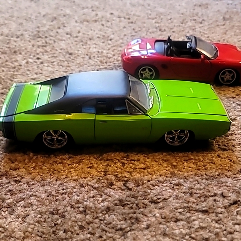 2 model cars 1 Porche 1 Charger
